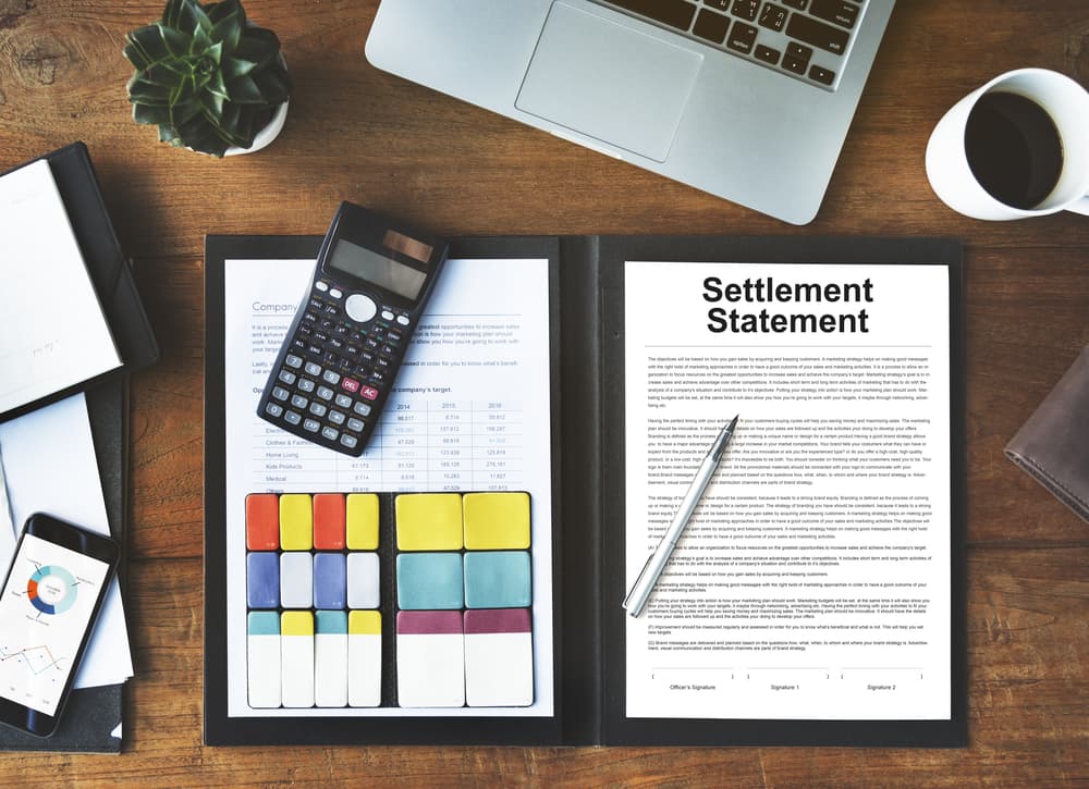 Insurance settlement concept illustrated through a settlement statement. Legal and financial details encapsulated in the document, symbolizing resolution and agreement.