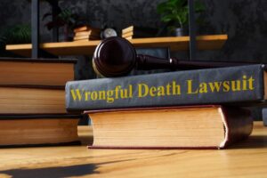 Pile of Books with "Wrongful Death Lawsuit" Text.