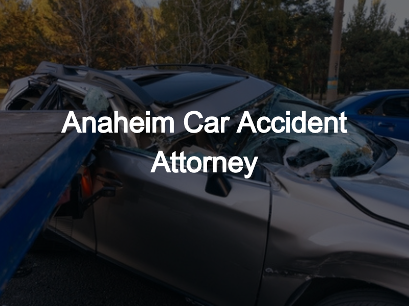 Wrecked SUV being towed after a serious crash, with visible damage to the front and roof, representing a car accident scene in Anaheim.